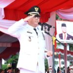 Berlangsung Khidmat, Pj Bupati Banyuasin Pimpin Upacara Pengibaran Bendera Merah Putih 