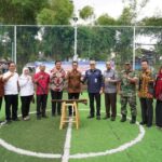 PJ Sekda Banyuasin Resmikan Lapangan Futsal Balitbun dan Serah Terima Bantuan Bedah Rumah