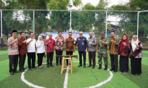 PJ Sekda Banyuasin Resmikan Lapangan Futsal Balitbun dan Serah Terima Bantuan Bedah Rumah